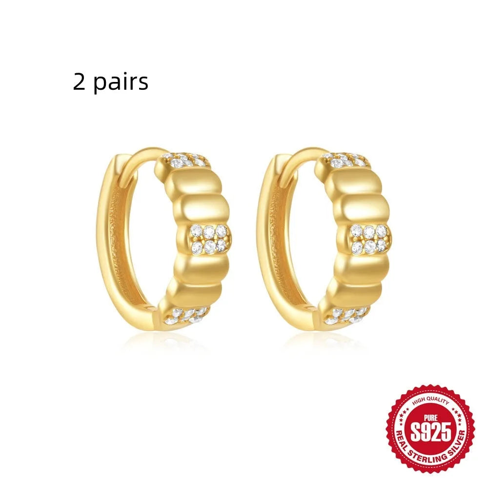 Small round geometric sterling silver stud earrings with diamond accents in gold or silver finish