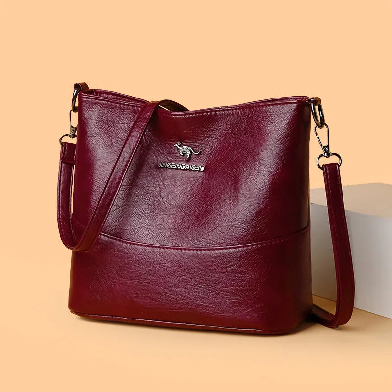 Women's soft leather large capacity shoulder bag in bucket design with internal organisation