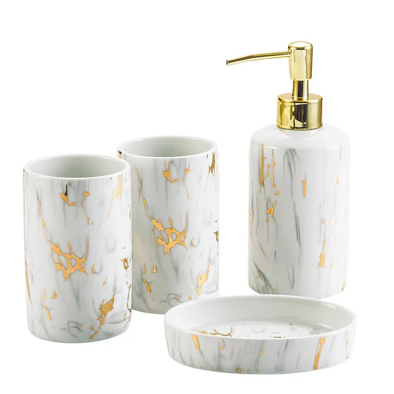 White ceramic bathroom wash set with marble finish showing two cups, soap box, and latex bottle