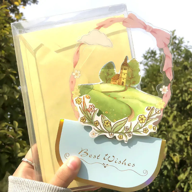 Handmade 3D butterfly-shaped greeting card with artificial flowers in a box, alongside its matching envelope.