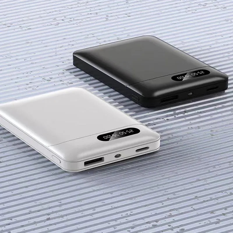White portable power bank showing multiple USB ports and compact 92x63x23mm dimensions