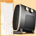 White and black gold electric fan heater with mechanical control dials on the front.