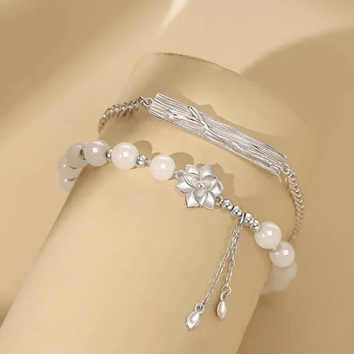 New Chinese style beaded bracelet with floral resin design in matching couple colour options
