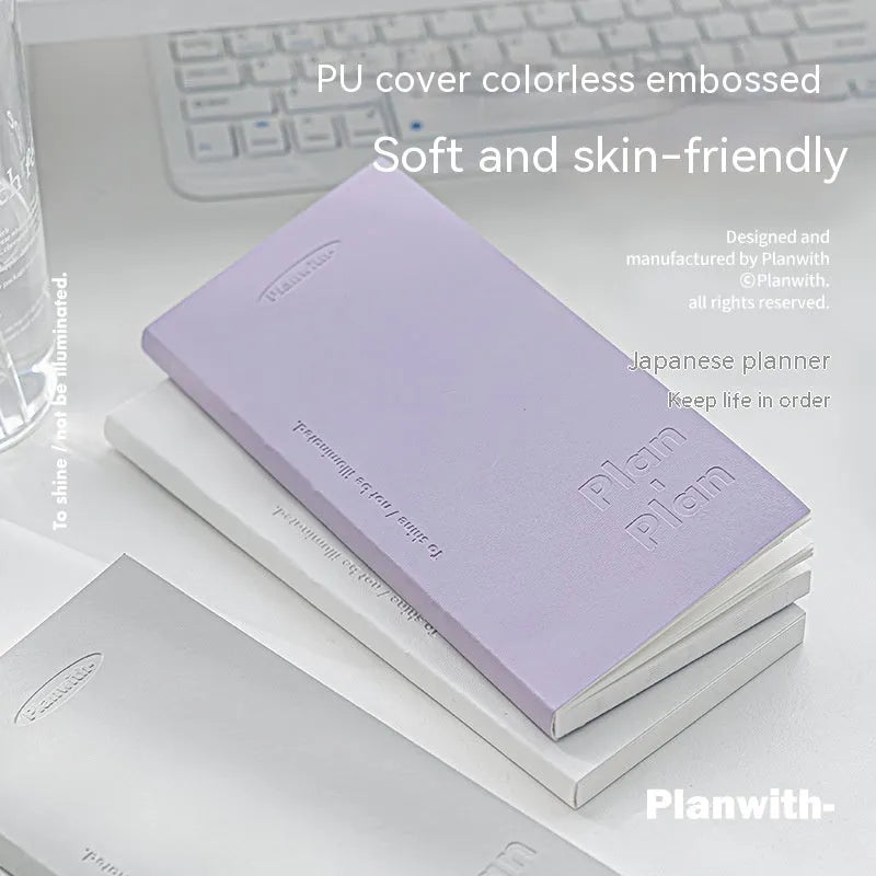 Embossed simple visual daily meter book notebook open, showing white 100g paper, available in blue, grey, purple, white, and protective cover colours.