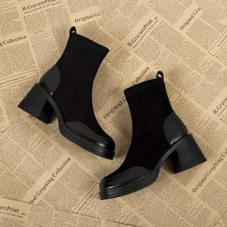 Thick bottom chunky heel Martin boots for women in black with lace-up fastening and rubber sole