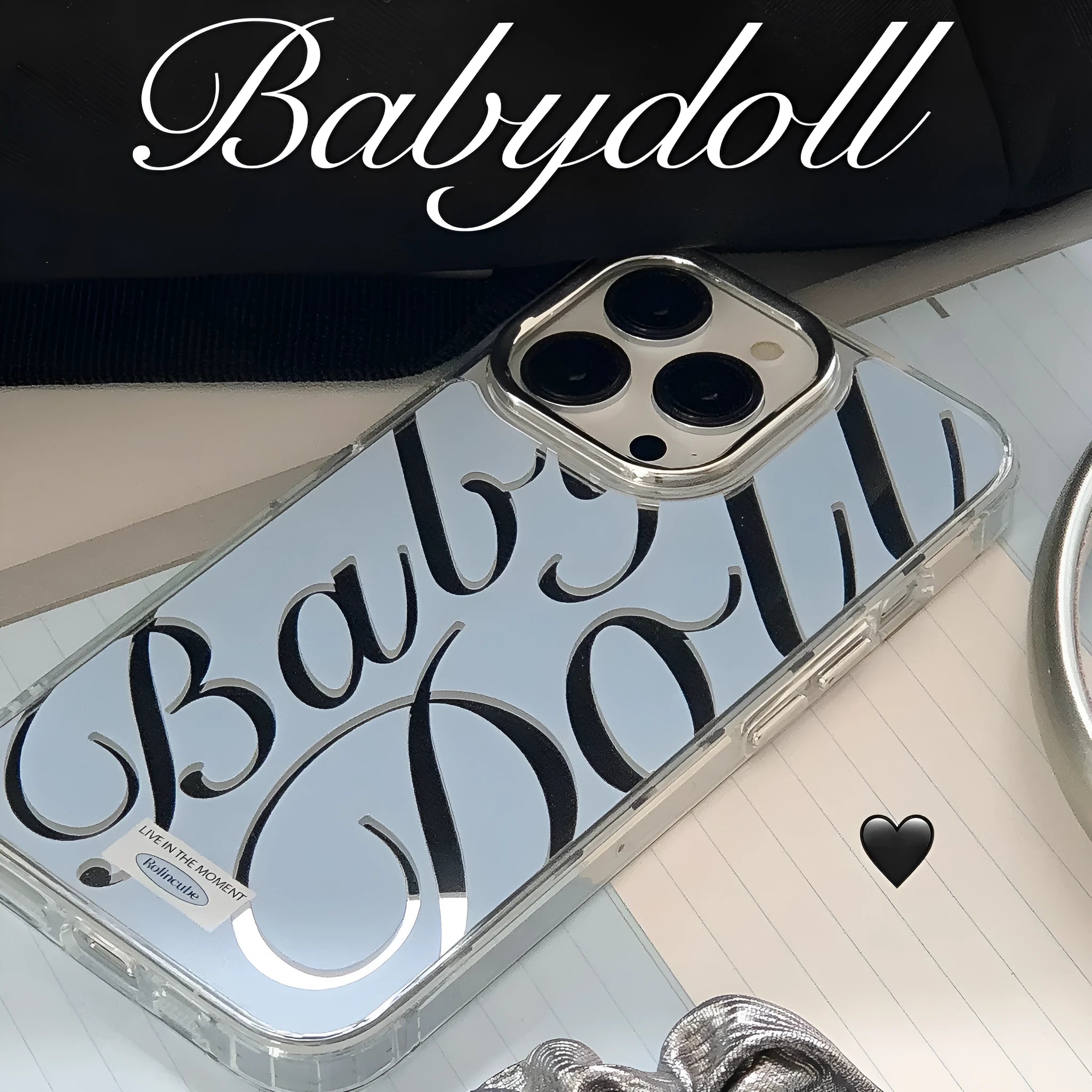 Blue transparent iPhone case with mirror finish showing English letters on back