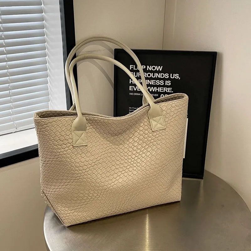 Woven PU shoulder bag for women with double straps, available in beige, black, gray, and khaki