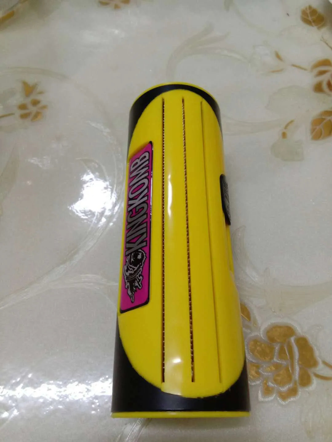 Pet comb with stainless steel teeth and red ABS handle for grooming dogs and cats.