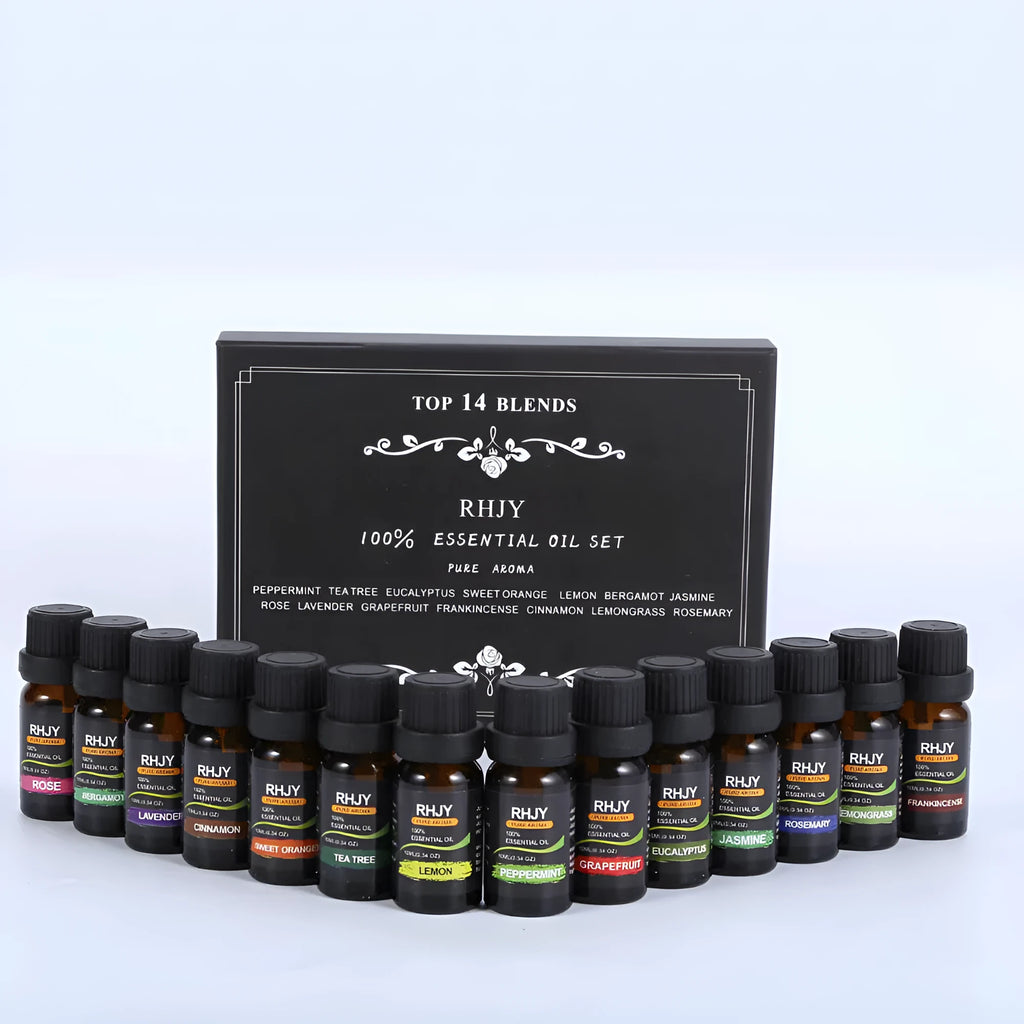 Essential oil set of 14 fragrances in 10ml bottles including rose, lavender, and lemon on a surface
