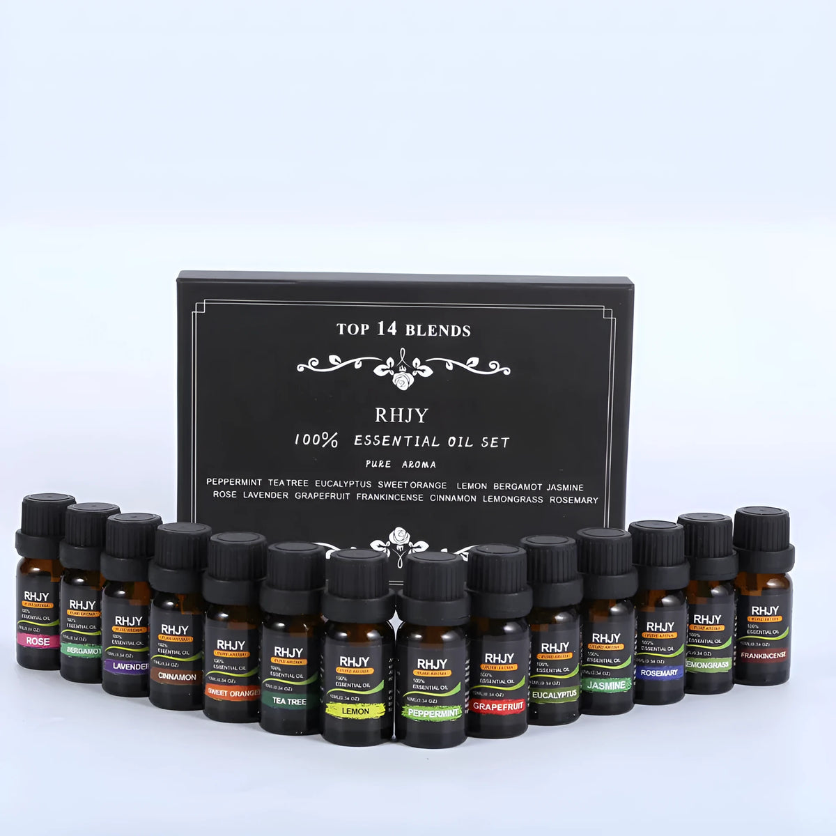 Essential oil set of 14 fragrances in 10ml bottles including rose, lavender, and lemon on a surface