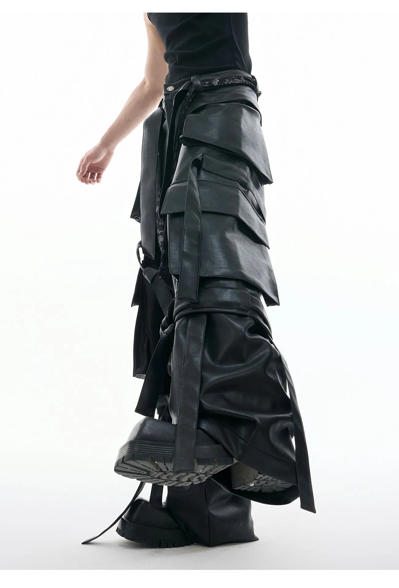 Black quilted leather pants with multiple pockets and ribbon stitching detail