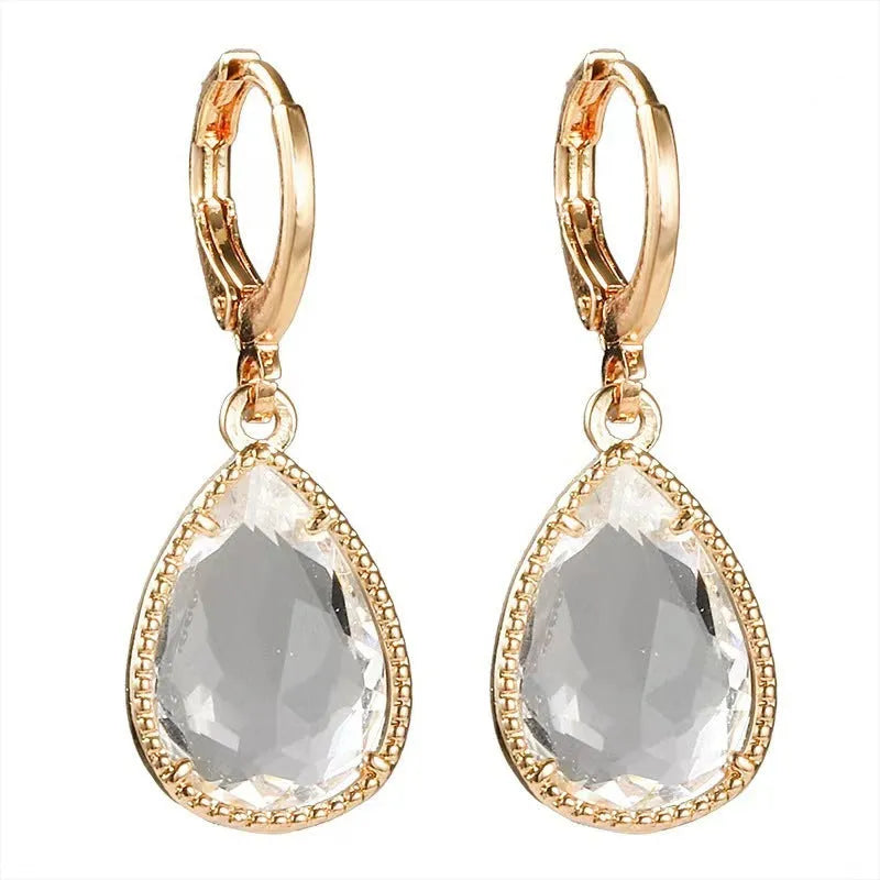 Geometric glass water drop earrings with carved Saturn design in multiple colours