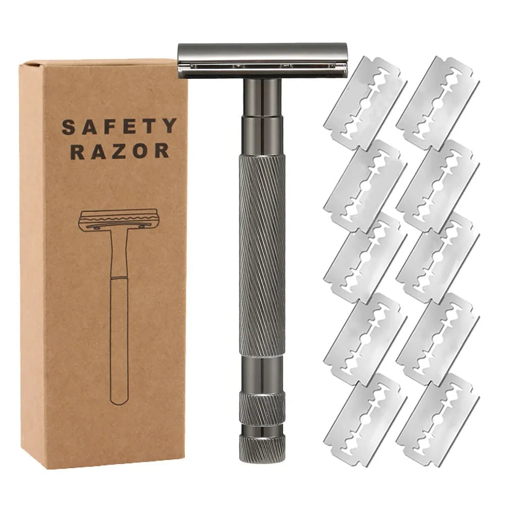 Manual double-sided safety razor with alloy handle, shown with replacement blades on a towel.