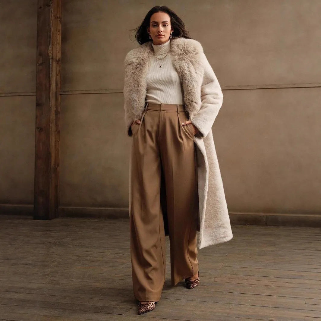Women's long faux fur coat in camel colour shown from the front.