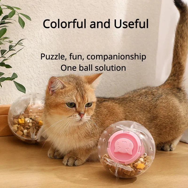 Clear blue ABS plastic slow feeder ball for cats, 11.5cm in diameter, on a wooden floor.