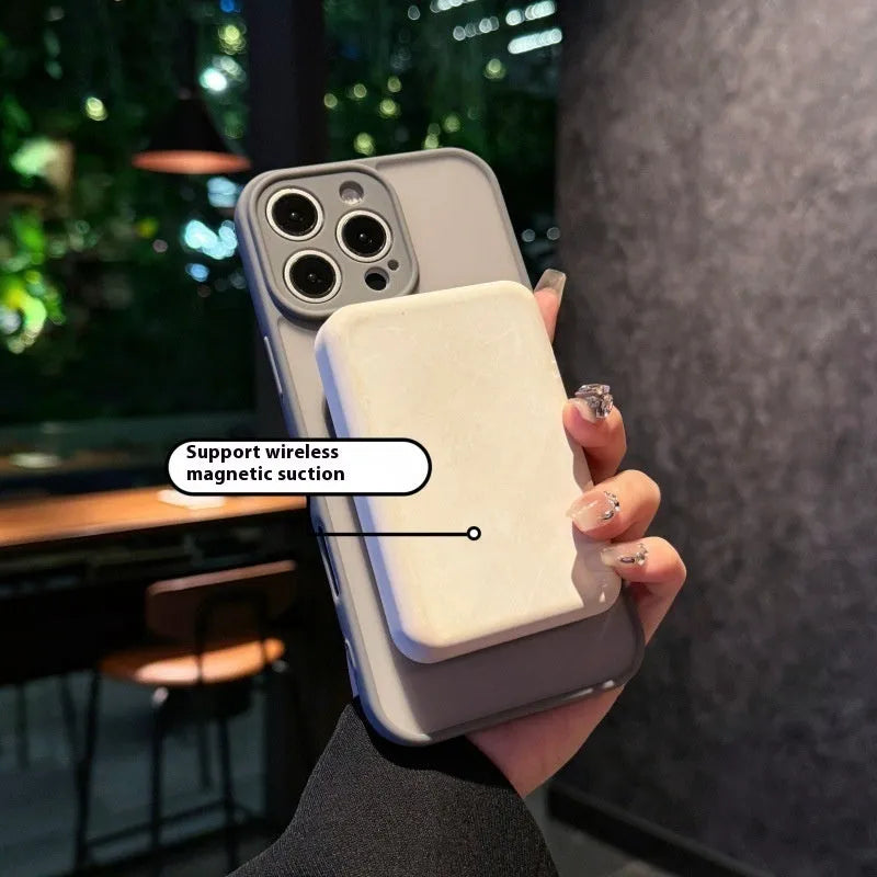 Frosted transparent magnetic phone case with a built-in stand for iPhone, shown in plum colour.