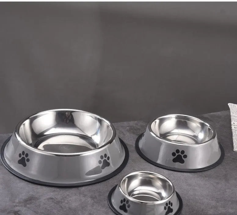 Non-slip stainless steel pet bowl in gray on a floor, size 22cm
