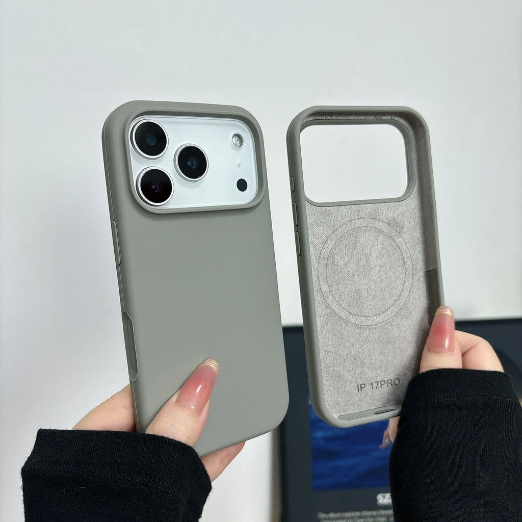 Liquid silicone magnetic iPhone case with Ai button in antique white colour on a table.