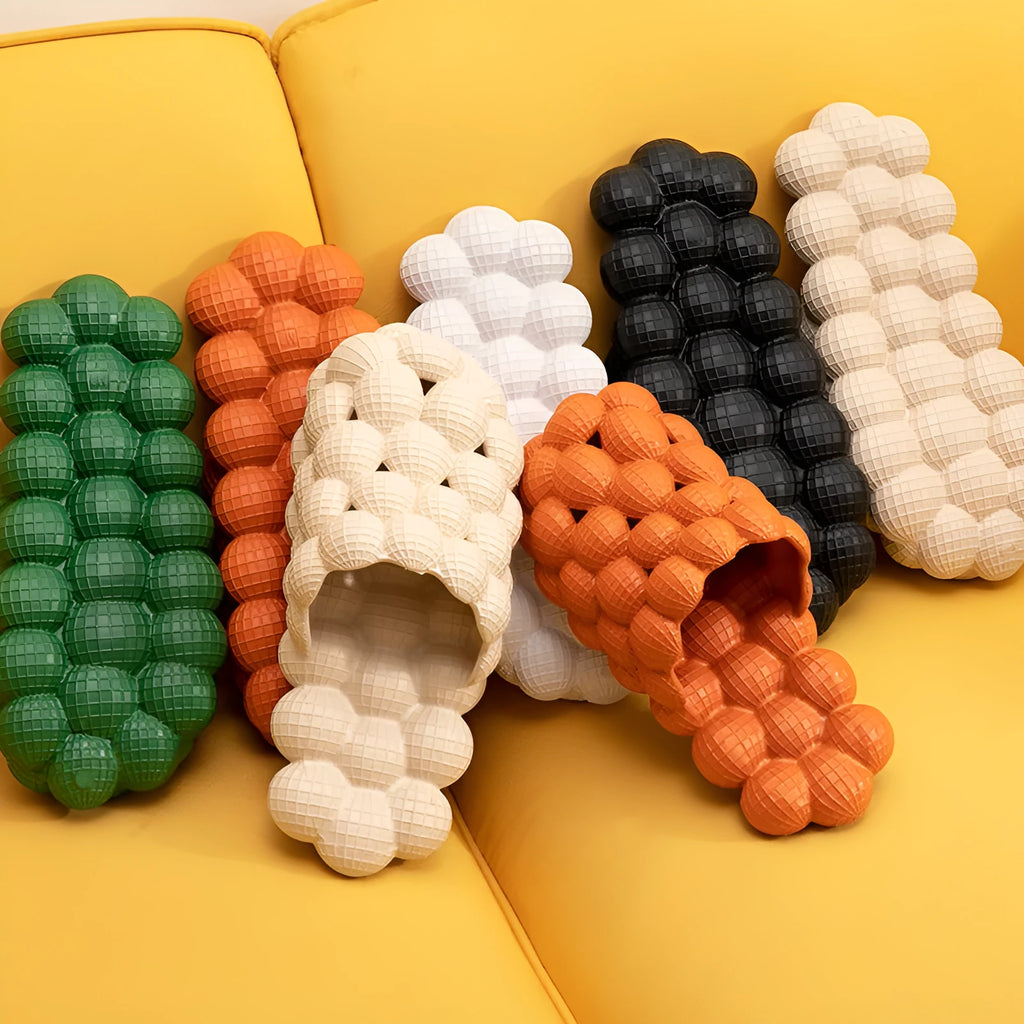 Creative Herringbone Baotou thick-soled bathroom slippers in orange, EVA sole with textured tread and upturned toe