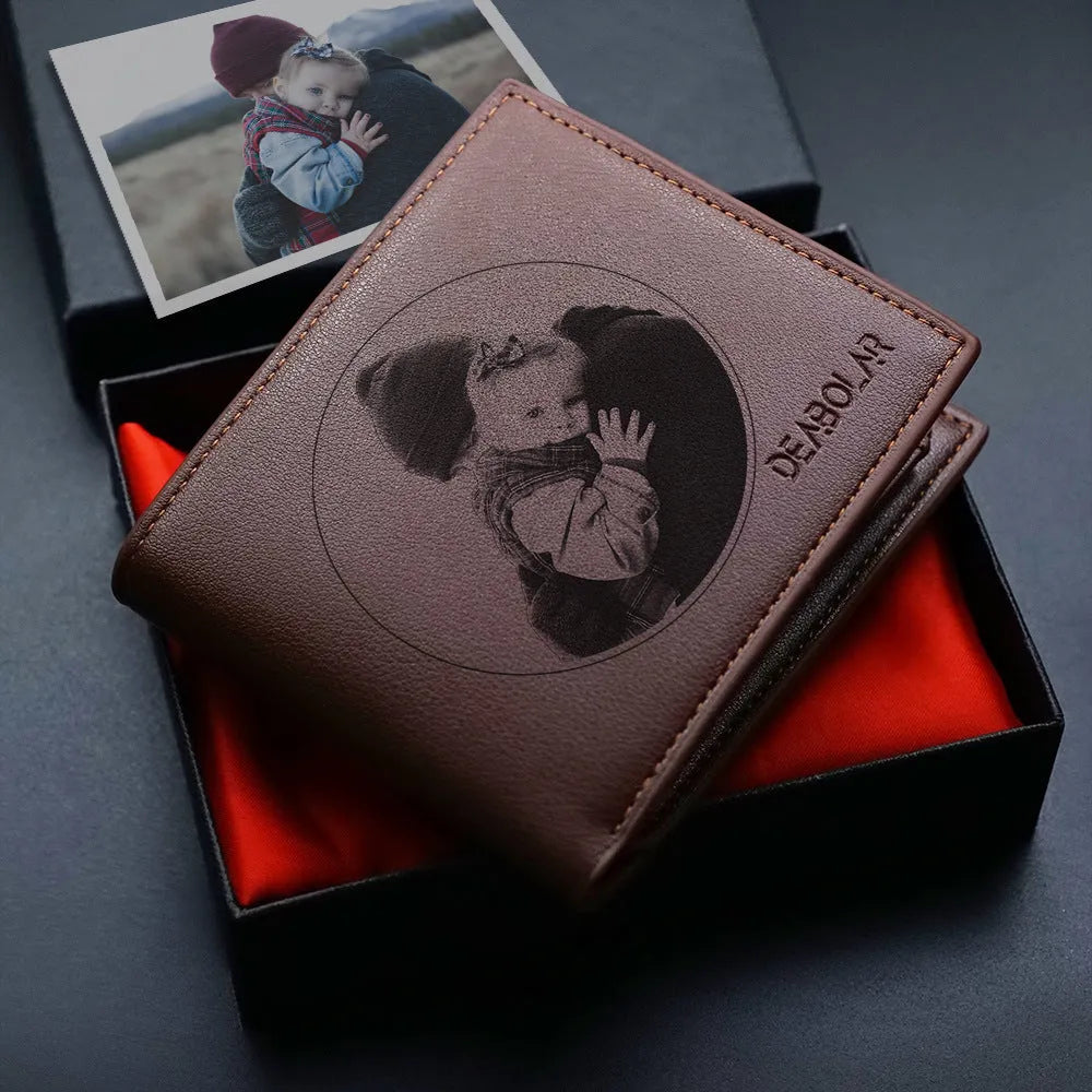 Men's brown leather wallet with a gold zipper closure laid flat.