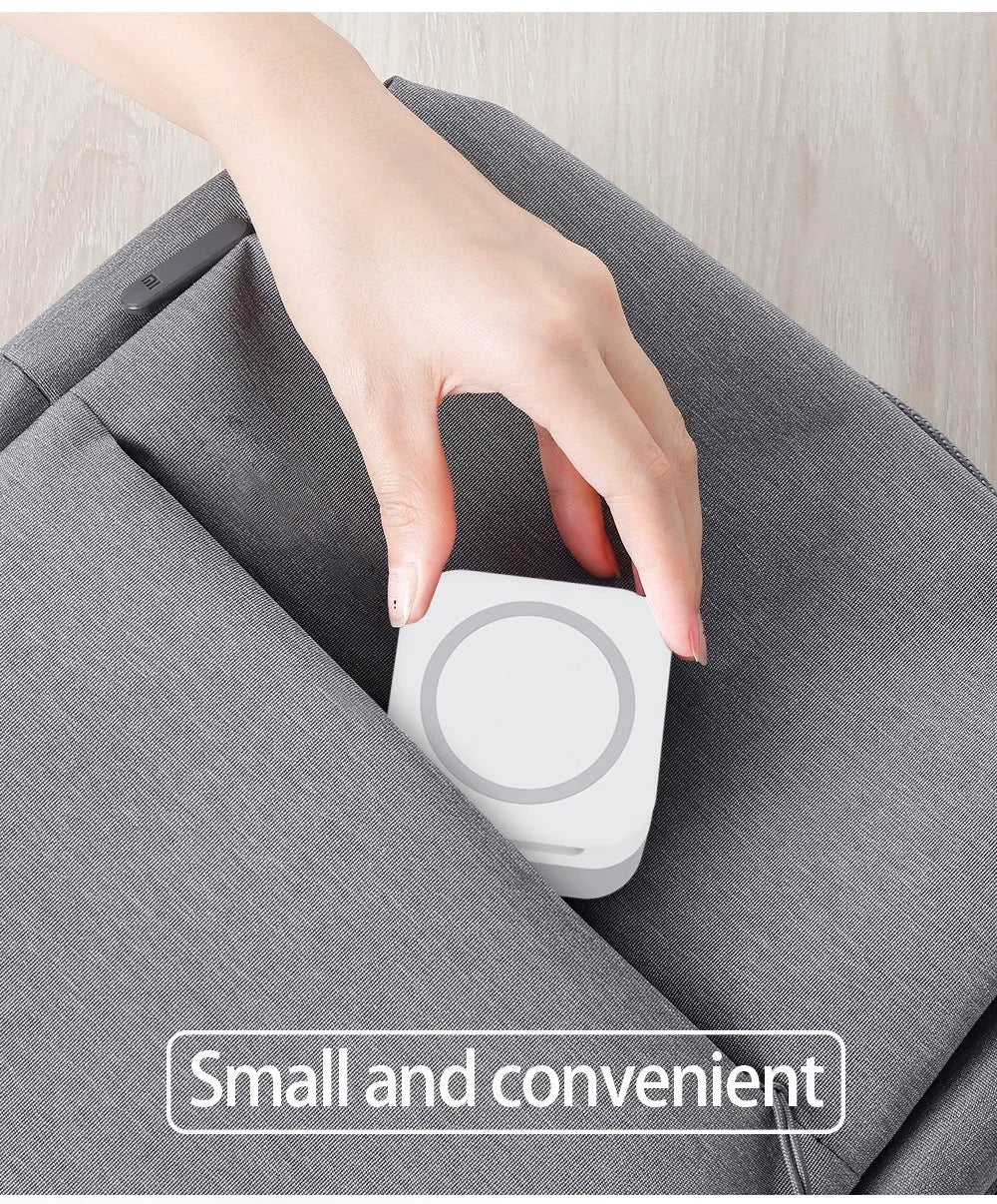 White 3-in-1 wireless charger with hidden removable storage panel for phone, earbuds, and watch