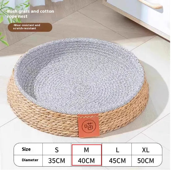 Natural rattan cat bed nest shown in a small size, suitable for a domestic cat.