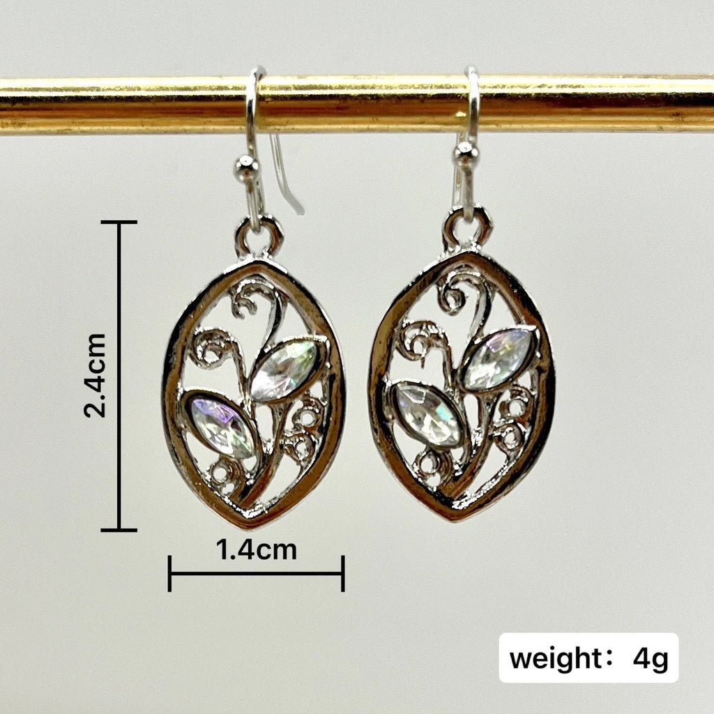 Silver leaf-shaped earrings with colourful embedded moonstone pieces and diamond treatment