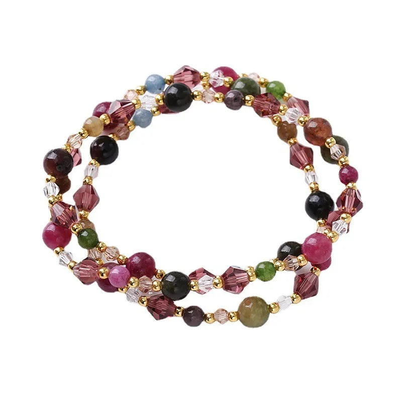 Handmade three-ring crystal bracelet with tourmaline, strawberry quartz and amethyst gemstones