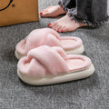 Women's platform fuzzy suede open toe criss-cross house slippers in Khaki on a wooden floor