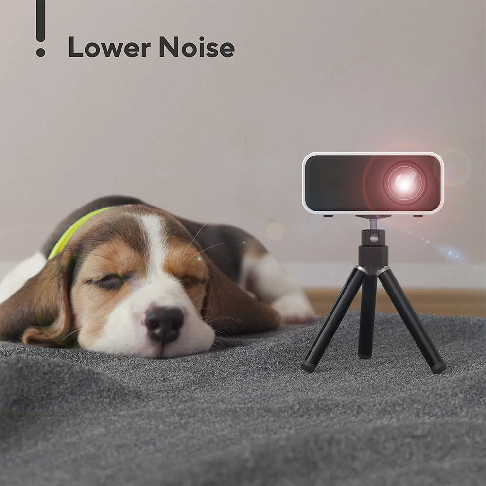 YT300 black or white portable mini projector with remote control on a table