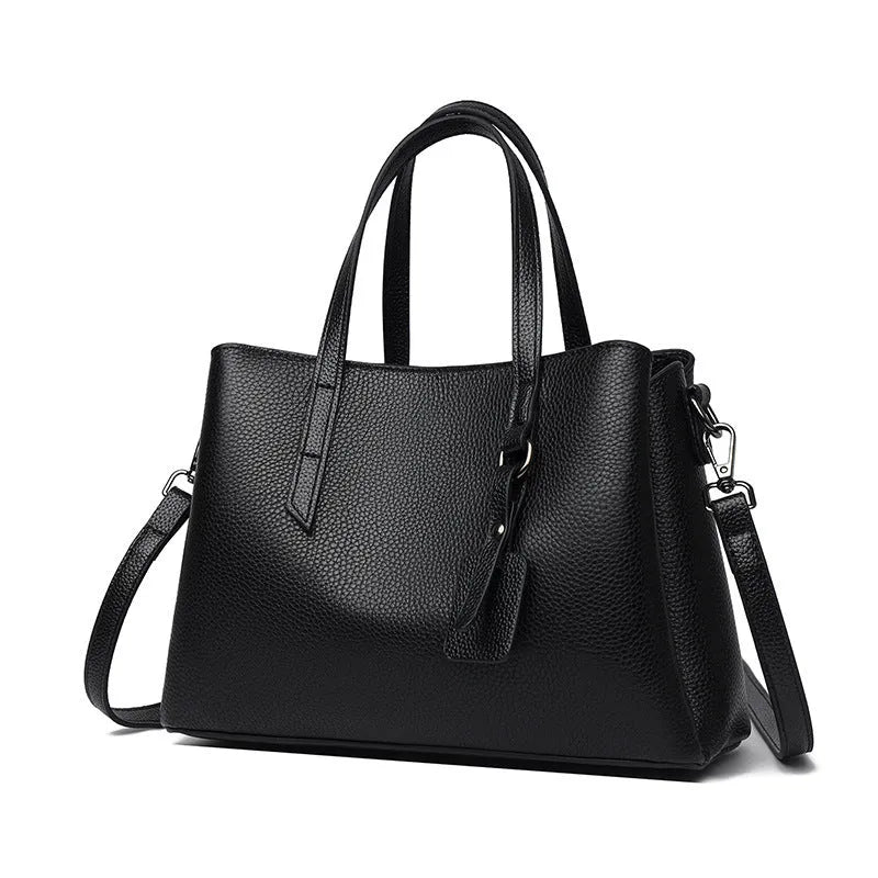Genuine cowhide leather women's handbag in horizontal square shape with shoulder strap and organisational compartments