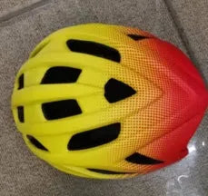 Orange mountain bike helmet showing ventilation holes and in-mould construction
