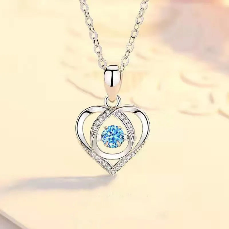 Blue heart necklace and bracelet jewellery set with diamond detailing on copper chains