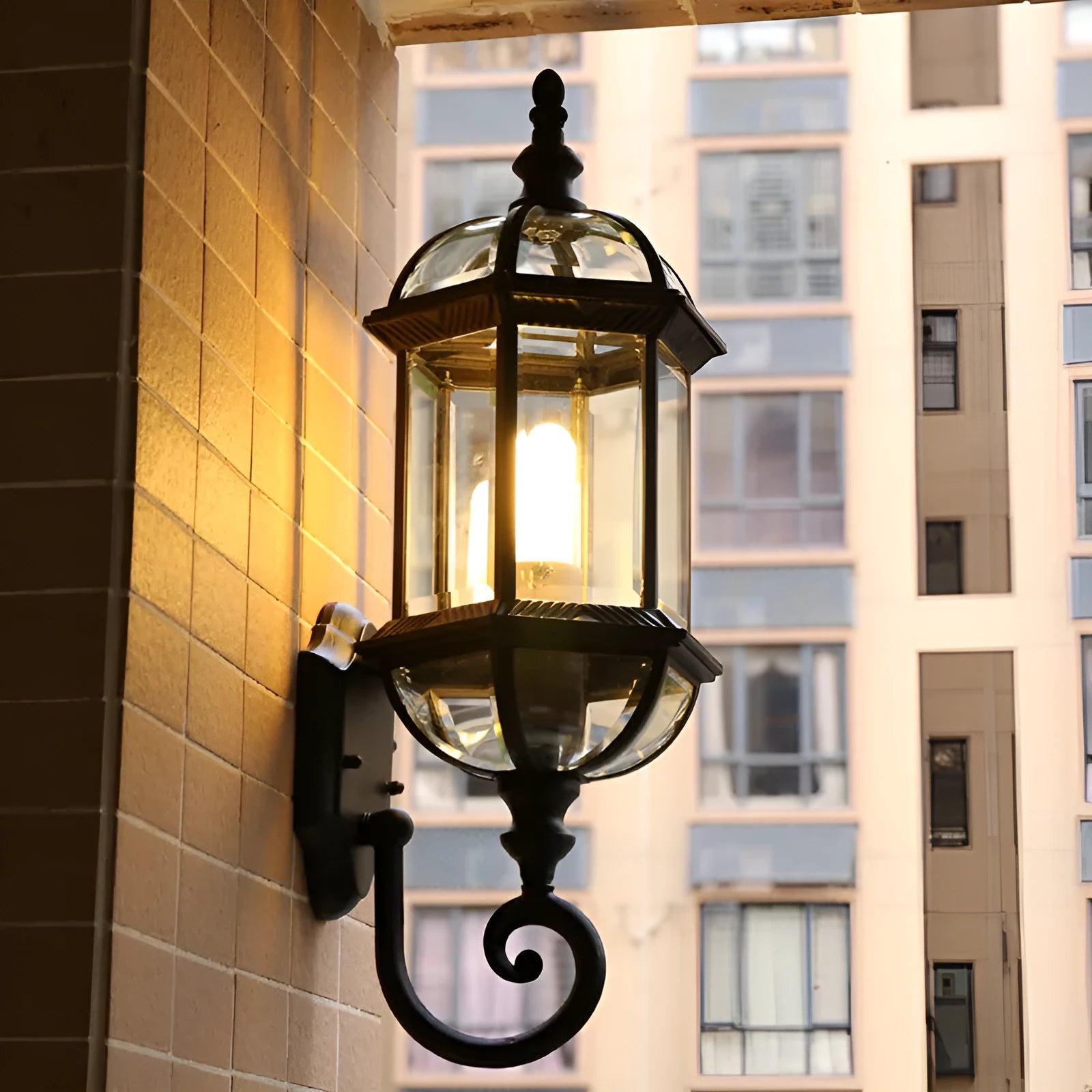 Gold aluminium outdoor waterproof wall lamp with a three-layer eight-inch frame mounted on a wall.