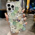Diamond rose flower TPU phone case for iPhone 15 Pro Max in purple rose, showing anti-fall and anti-fingerprint design
