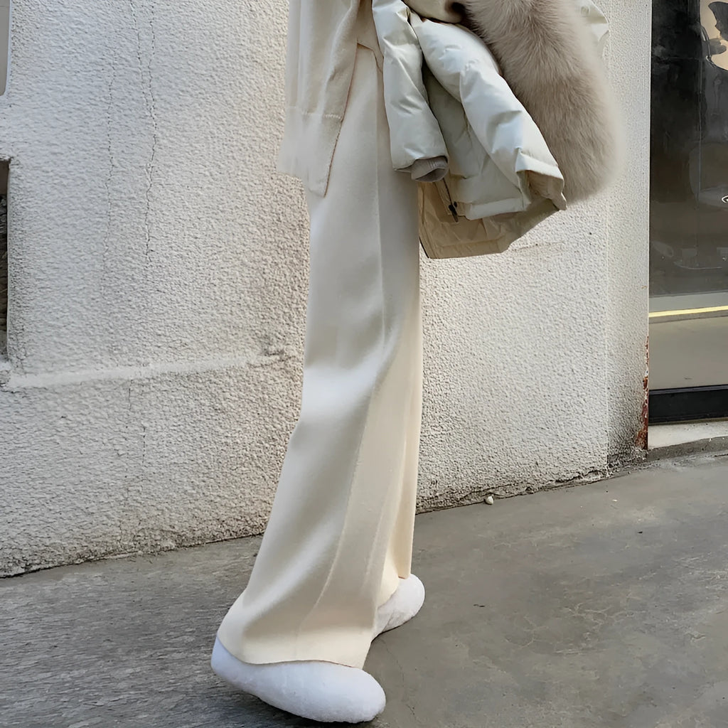 Women's thick knitted wide-leg winter trousers in straight-leg style with elastic high waist