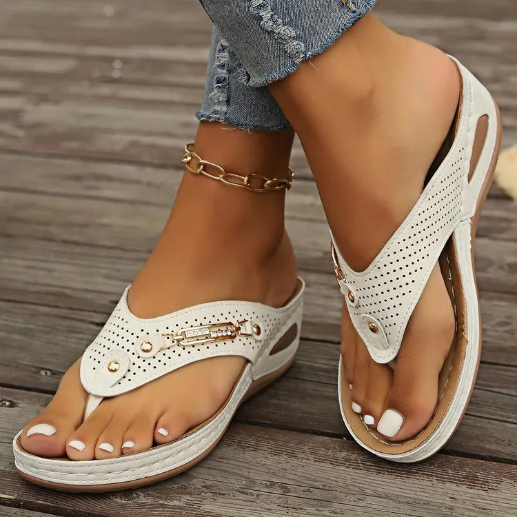 Women's retro flip-flop sandals with herringbone pattern, shown in light brown colour.