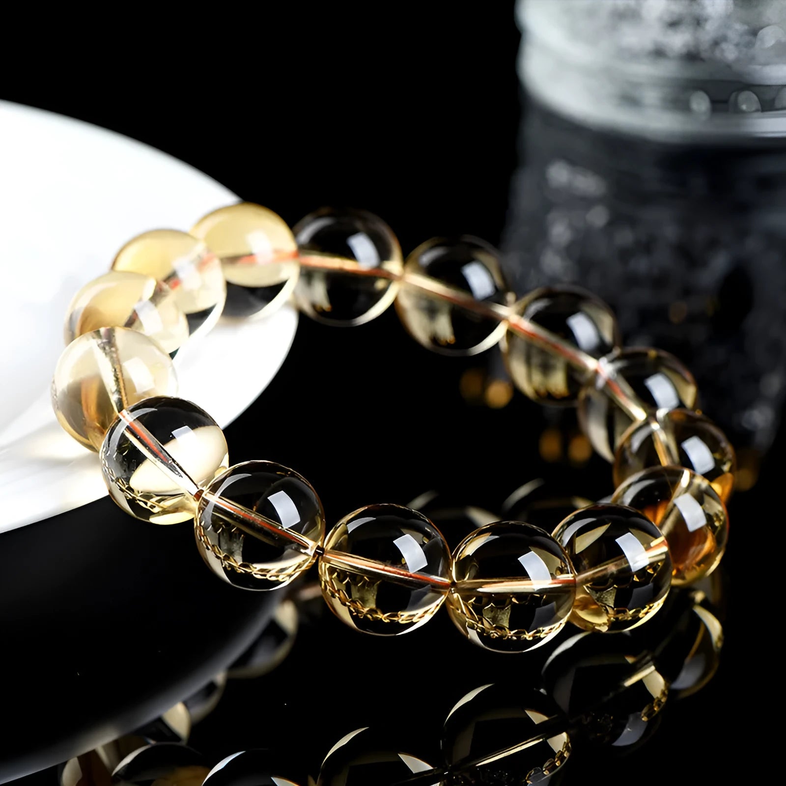 Natural citrine scattered beads bracelet showing polished yellow gemstones on a string, available in multiple bead sizes.