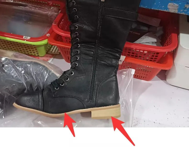 Women's solid colour cross strap knight boots with artificial PU upper, available in black, brown, and red