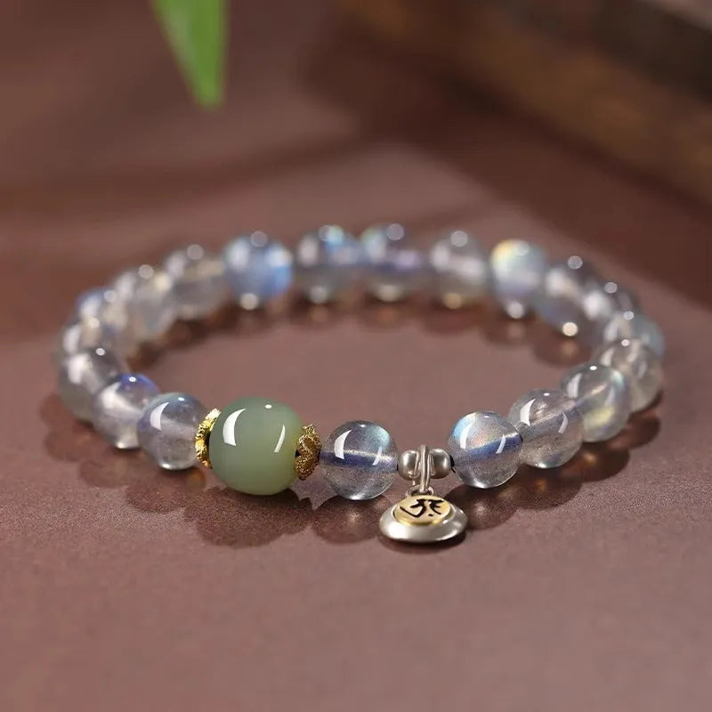 Moonstone crystal bracelet with 8mm beads showing Thousand-Hand Kwan-yin mouse design