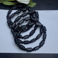 Black tourmaline rough stone bracelet with natural textured beads measuring 8.5-9mm and adjustable closure