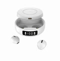 Mini semi-in-ear headphones with wireless charging compartment in black colour