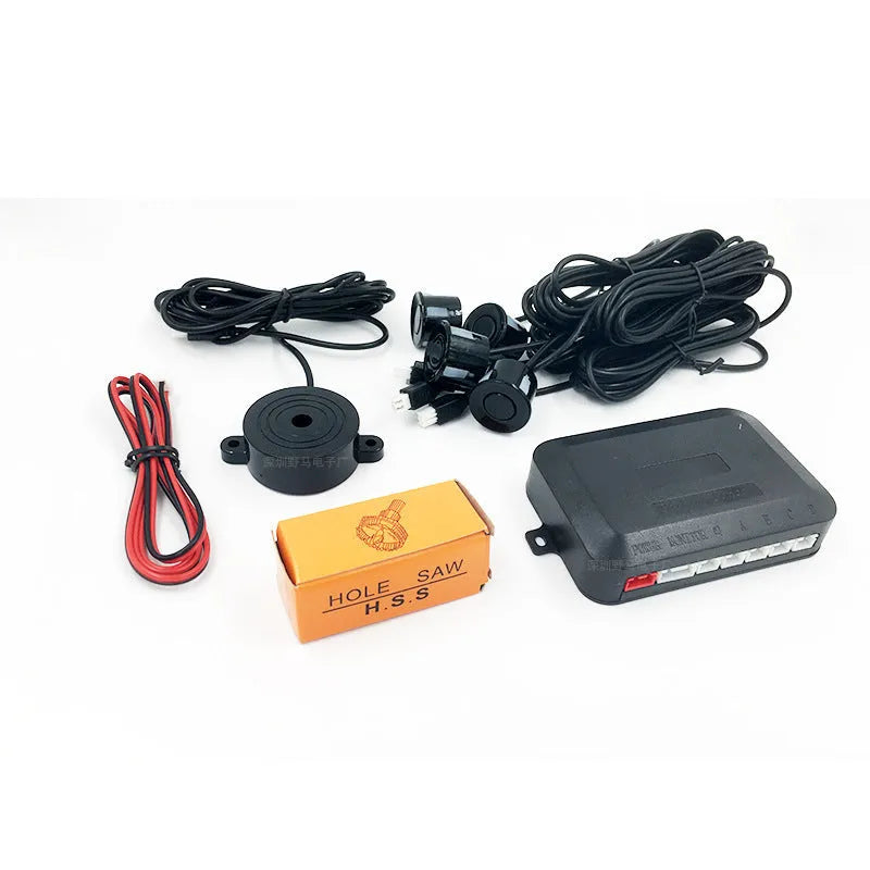 Four-probe pure buzzer reversing radar with ultrasonic sensors in different colours on a car bumper.