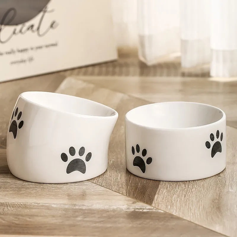 Ceramic cat bowl with high foot design in cat's paw pattern available in multiple colours