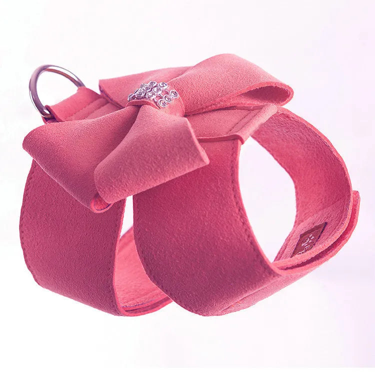 Puppy wearing microfiber chest strap with bowknot design in pink, blue, or orange colour