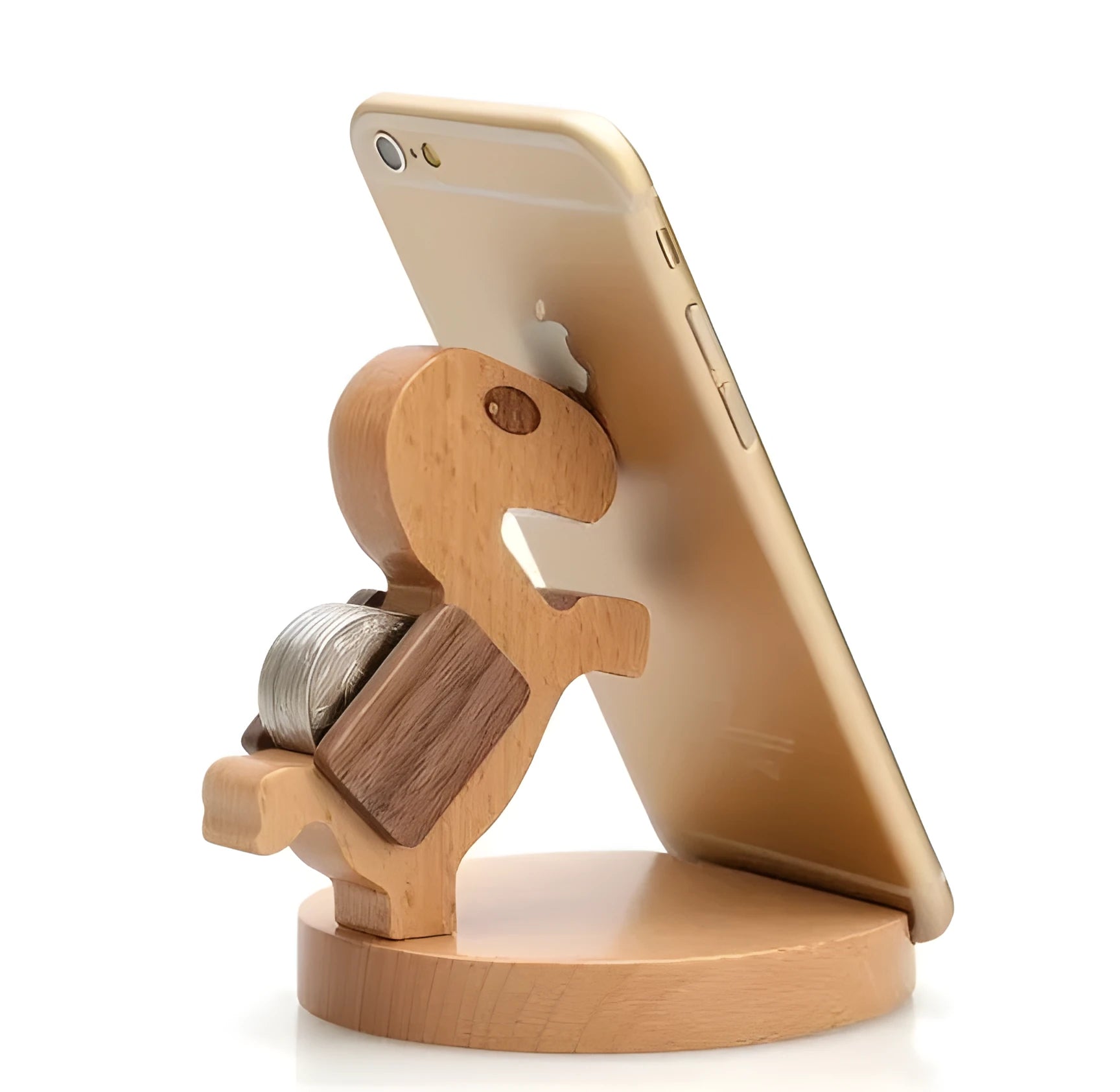 Beech wood and resin lazy bracket mobile phone holder in an animal design style on a desk.