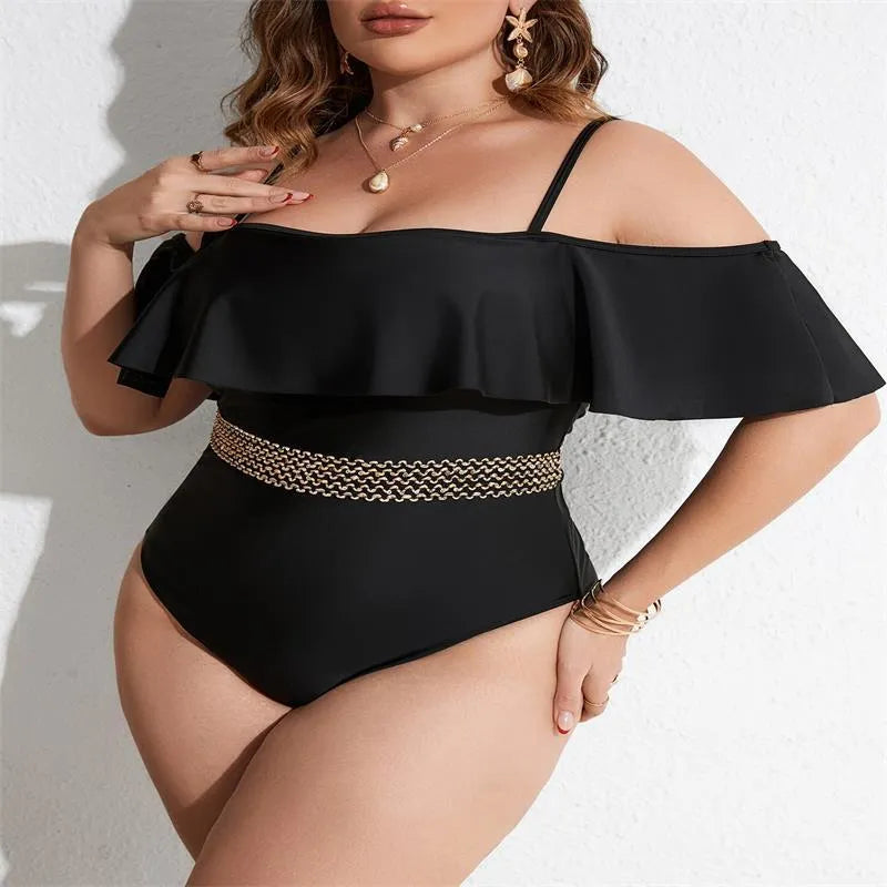Women's solid black one-piece polyester swimsuit on a hanger