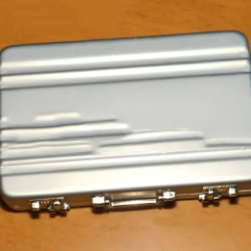 Aluminium alloy metal card holder in six colour options showing compact 100x65mm dimensions