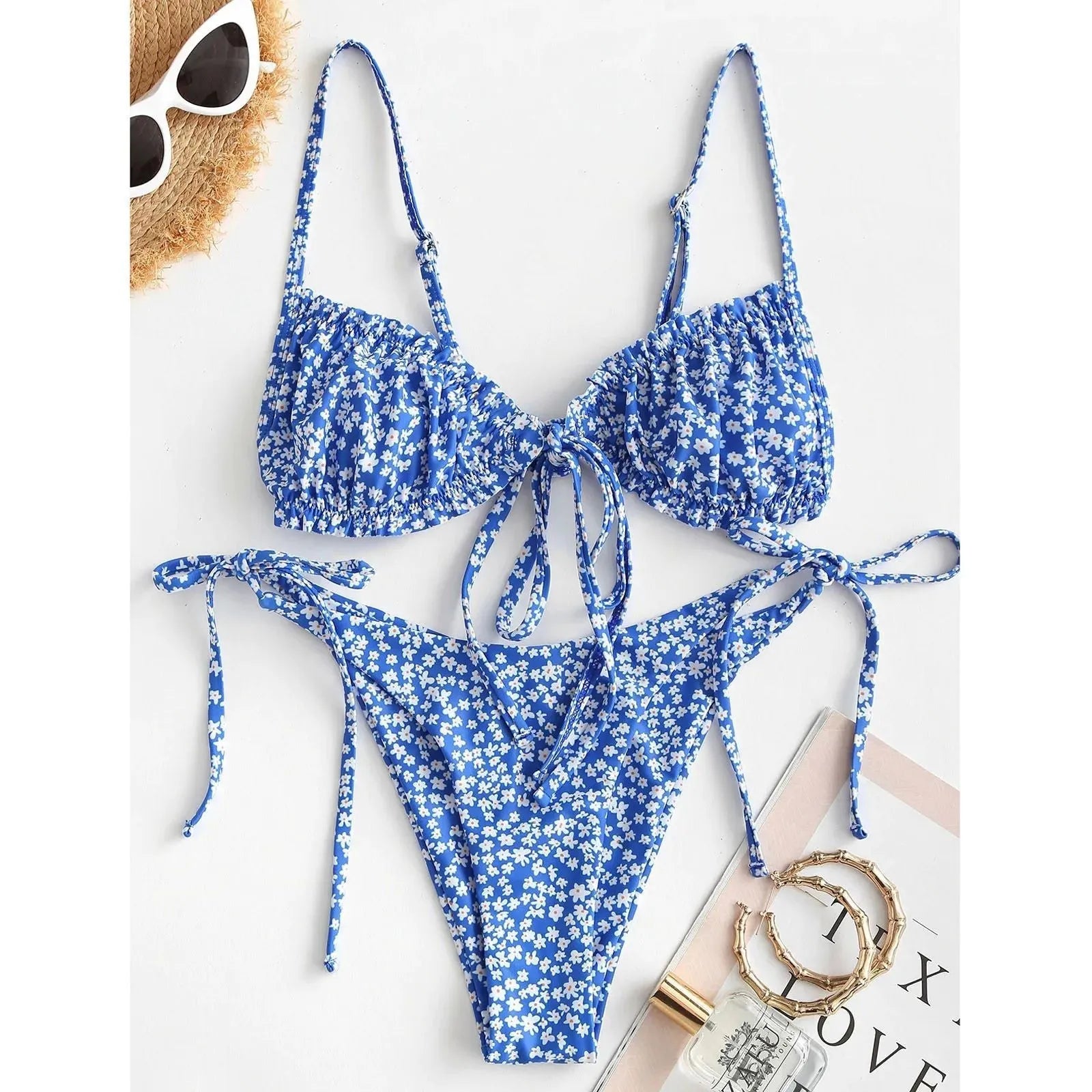 Women's printed multi-rope banded bikini swimsuit in blue or pink polyester with short sleeves