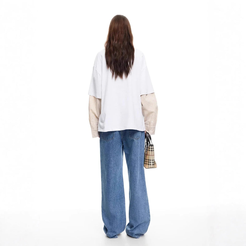Women's straight-leg multi-button low-waist jeans in blue stone-washed cotton denim, side view